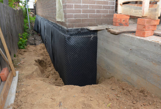 Happy homeowners after waterproofing job in West Milford